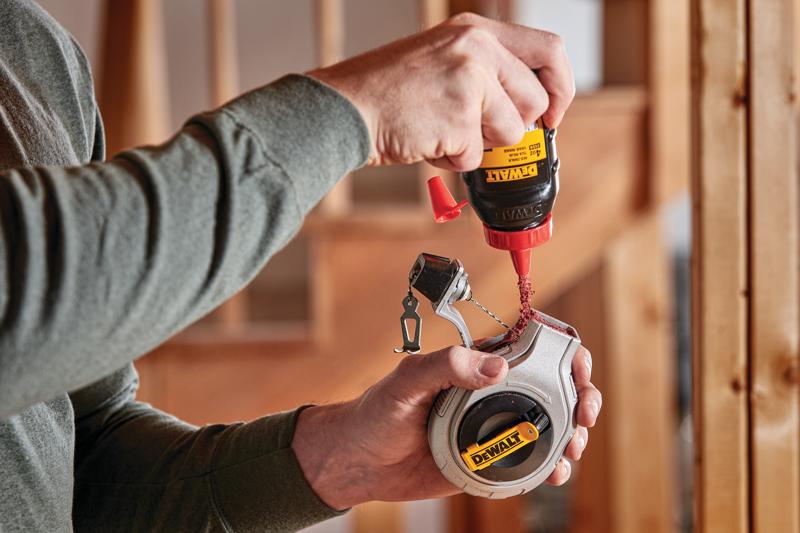 6 to 1 and ratio Chalk Reel Kit being refilled with red chalk by person.