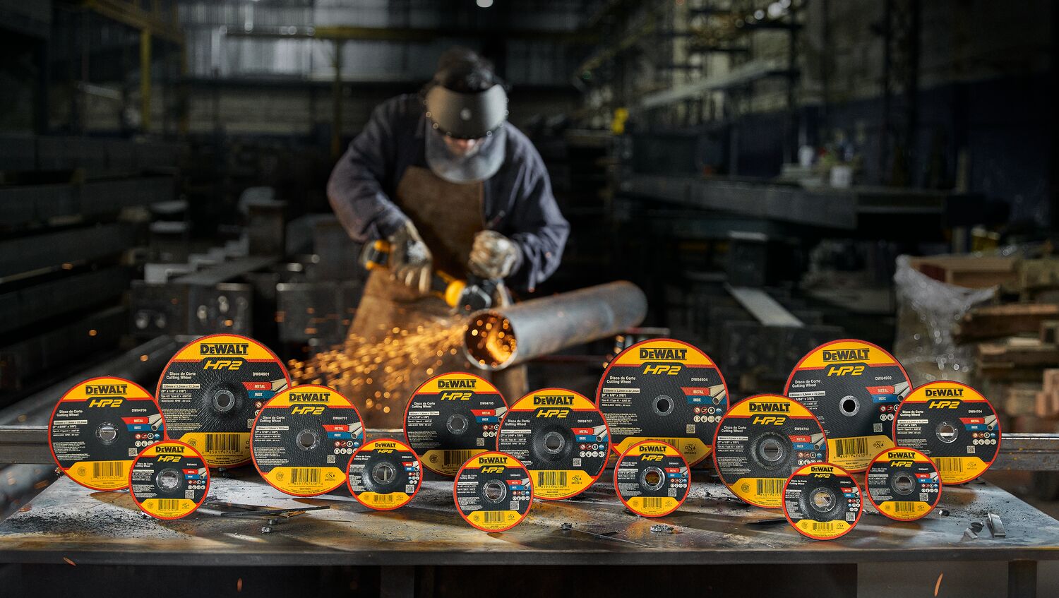 DEWALT METAL FACTORYFRONT VIEWPACKSHOT with operator cutting steel pipe on te back